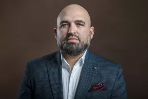 A front facing Business Headshot of christian