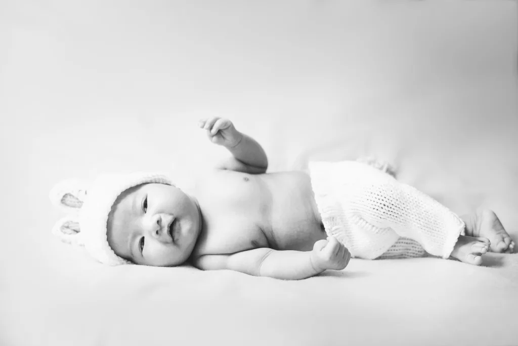 Black and white newborn photography of baby liam