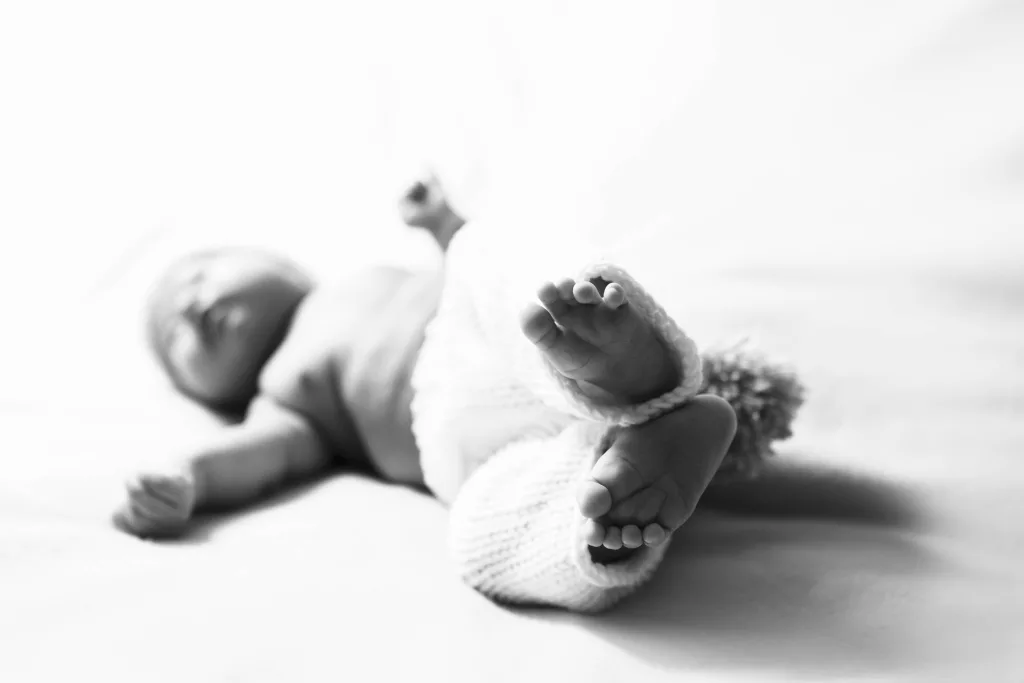 Black and white photo of little baby toes