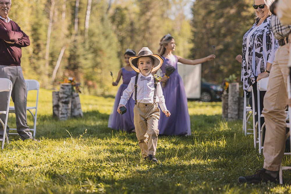 wedding photography of Child walking at outdoor wedding