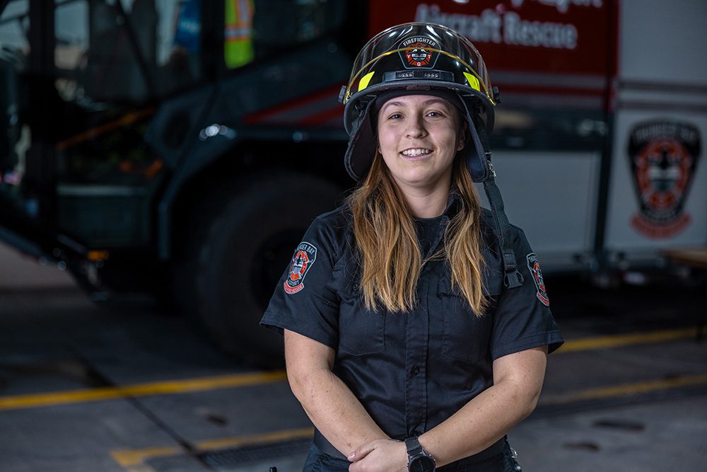 Corporate milestone photography professional headshot of airport firefighter in uniform