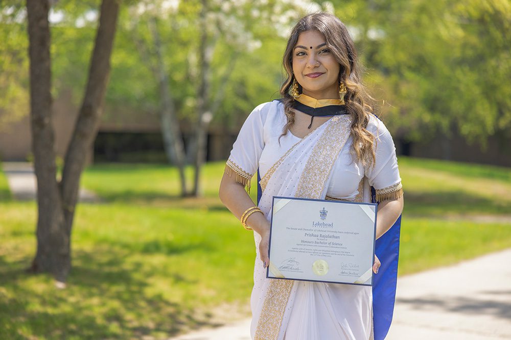 University graduation photography professional portrait of graduate in traditional and cultural attire