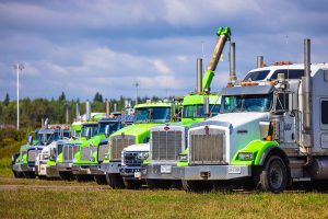 Professional angled perspective photograph of towing company fleet showing scale and organization for business marketing