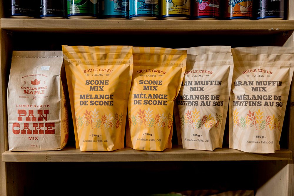 Shelf display of Brule Creek Farms baking mixes including scone and bran muffin products